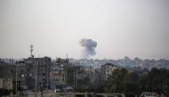 Smoke billows during Israeli bombardment in eastern Rafah in the southern Gaza Strip on May 19, 2024. (Photo by AFP)