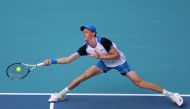 Jannik Sinner of Italy returns a shot against Tallon Griekpoor of the Netherlands during their match on Day 9 of the Miami Open at Hard Rock Stadium on March 24, 2024 in Miami Gardens, Florida. Al Bello/Getty Images/AFP

