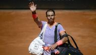 Spain's Rafael Nadal greets fans as he leaves the field after being defeated by Poland's Hubert Hurkacz during the Men's ATP Rome Open tennis tournament at Foro Italico in Rome on May 11, 2024. (Photo by Filippo MONTEFORTE / AFP)
