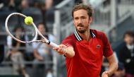 Russia's Daniil Medvedev plays a forehand return to US Tommy Paul during the Men's ATP Rome Open tennis tournament at Foro Italico in Rome on May 14, 2024. (Photo by Isabella BONOTTO / AFP)
