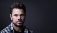 Swiss professional tennis player Stanislas Wawrinka poses during a photo session in Paris on May 23, 2024. (Photo by Joel Saget / AFP)