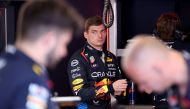 Red Bull Racing's Dutch driver Max Verstappen looks on from the pits during the qualifying session of the Formula One Monaco Grand Prix on May 25, 2024 at the Circuit de Monaco, on the eve of the race. (Photo by Claudia Greco / POOL / AFP)