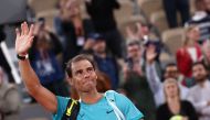 Spain's Rafael Nadal gestures as he leaves the court after losing against Germany's Alexander Zverev in their men's singles match on Court Philippe-Chatrier on day two of The French Open tennis tournament at The Roland Garros Complex in Paris on May 27, 2024. (Photo by Emmanuel Dunand / AFP)