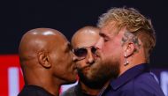 (Files) Former US boxer Mike Tyson (L) and YouTuber Jake Paul face off during a press conference at the Apollo Theatre in New York, on May 13, 2024. (Photo by Kena Betancur / AFP)
 