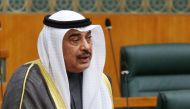 (Files)  Sheikh Sabah Khaled Al-Hamad Al-Sabah, then Kuwait's prime minister speaks during a parliament session at the National Assembly in Kuwait City on March 7, 2022. (Photo by Yasser Al-Zayyat / AFP)