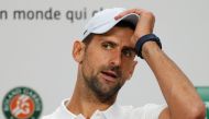 Serbia's Novak Djokovic hold a press conference on day five of the French Open tennis tournament at the Roland Garros Complex in Paris on May 30, 2024. (Photo by Dimitar DILKOFF / AFP)