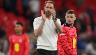 England's manager Gareth Southgate applauds fans on the pitch after the International friendly football match between England and Iceland at Wembley Stadium in London on June 7, 2024.  (Photo by Glyn Kirk / AFP)