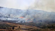 Fire sweeps over fileds targeted by Israeli artilley on the outskirts of the southern Lebanese village of Rmeish on June 4, 2024, amid ongoing cross-border clashes between Israeli troops and Hezbollah fighters. Photo by Kawnat HAJU / AFP.