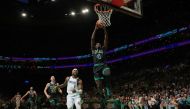 Boston: Jrue Holiday of the Boston Celtics drives to the basket during the game against the Dallas Mavericks during Game 2 of the 2024 NBA Finals on June 9, 2024 at the TD Garden in Boston, Massachusetts.(Photo by Jesse D. Garrabrant /  AFP)