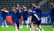 Croatia's midfielder #10 Luka Modric (L) and teammates take part in a MD-1 training session in Berlin on June 14, 2024. (Photo by Christophe Simon / AFP)