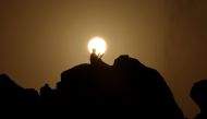 Pilgrims pray at dawn on Saudi Arabia's Mount Arafat during the climax of the Hajj pilgrimage on June 15, 2023. (Pictures by Fadel Senna / AFP)