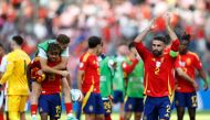 Spain's defender Dani Carvajal (R) celebrates after winning the UEFA Euro 2024 Group B football match between Spain and Croatia at the Olympiastadion in Berlin on June 15, 2024. (Photo by Odd ANDERSEN / AFP)
