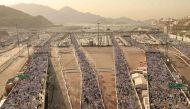 Pilgrims arrive to perform the symbolic 'stoning of the devil' ritual as part of the hajj pilgrimage in Mina, near Saudi Arabia's holy city of Mecca, on June 16, 2024. (Photo by Fadel Senna / AFP)