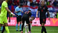 Croatia's midfielder #10 Luka Modric (C) reacts at the end of the UEFA Euro 2024 Group B football match between Croatia and Albania at the Volksparkstadion in Hamburg on June 19, 2024. (Photo by GABRIEL BOUYS / AFP)
