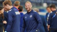 Denmark's goalkeeper #01 Kasper Schmeichel and Denmark's goalkeeper #22 Frederik Ronnow attend the training session of Denmark's national football team during the UEFA Euro 2024 in Frankfurt am Main, western Germany on June 19, 2024. (Photo by Liselotte Sabroe / Ritzau Scanpix / AFP) 