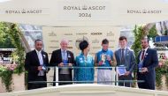 The connections of Shareholder pose with the trophies after winning the Gr.2 Norfolk Stakes. 