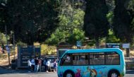 A new minibus drives on the island of Buyukada, in Istanbul on June 20, 2024. (Photo by Yasin Akgul / AFP)