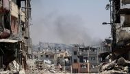 Smoke billows from an area targeted by Israeli bombardment in the Gaza City district of Shujaiya on June 28, 2024. Photo by Omar AL-QATTAA / AFP.