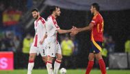 Spain's midfielder #16 Rodri and Georgia's defender #02 Otar Kakabadze greet each other at the end of the UEFA Euro 2024 round of 16 football match between Spain and Georgia at the Cologne Stadium in Cologne on June 30, 2024. (Photo by Kirill KUDRYAVTSEV / AFP)
