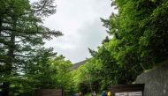 A general view shows the newly-built trail gate at Fuji Subaru Line 5th station, which leads to the popular Yoshida trail to climb Mount Fuji on July 1, 2024. (Photo by Philip Fong / AFP)