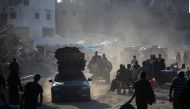 Displaced Palestinians from areas in east Khan Yunis arrive to the city as they flee after the Israeli army issued a new evacuation order for parts of the city and Rafah, in the southern Gaza Strip on July 2, 2024. (Photo by Eyad Baba / AFP)