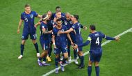 Netherlands' forward #18 Donyell Malen celebrates scoring his team's second goal with his teammates during the UEFA Euro 2024 round of 16 football match between Romania and the Netherlands at the Munich Football Arena in Munich on July 2, 2024. (Photo by Thomas Kienzle / AFP)