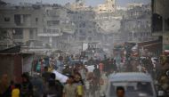 Displaced Palestinians from areas in east Khan Yunis arrive to the city as they flee Israel Hamas war on July 2, 2024. (Photo by Eyad Baba / AFP)