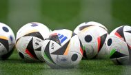 A photo shows tournament balls on the pitch prior to the UEFA Euro 2024 round of 16 football match between Austria and Turkey at the Leipzig Stadium in Leipzig on July 2, 2024. (Photo by Javier Soriano / AFP)