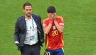 Spain's midfielder #20 Pedri leaves the pitch after being injured during the UEFA Euro 2024 quarter-final football match between Spain and Germany at the Stuttgart Arena in Stuttgart on July 5, 2024. (Photo by Miguel MEDINA / AFP)
