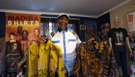 Sonwabile Ndamase, who used to design and style for the late former President of South Africa Nelson Mandela and the designer of the original Madiba shirt, shows some of his latest designs on July 4, 2024. (Photo by Phill Magakoe / AFP)