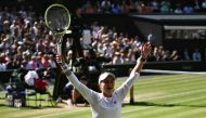 Czech Republic's Barbora Krejcikova celebrates winning against Italy's Jasmine Paolini during their women's singles final tennis match on the thirteenth day of the 2024 Wimbledon Championships at The All England Lawn Tennis and Croquet Club in Wimbledon, southwest London, on July 13, 2024. (Photo by Ben Stansall / AFP) 
