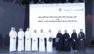 Ehsan and Qatar Museums officials during the signing ceremony.