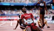 Qatar’s Ismail Doudai Abakar celebrates after achieving a personal best. AFP