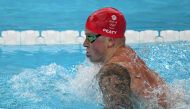 Britain's Adam Peaty compets in a semifinal of the men's 100m breaststroke swimming event at the Paris 2024 Olympic Games at the Paris La Defense Arena in Nanterre, west of Paris, on July 27, 2024. (Photo by Oli Scarff / AFP)