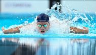 France's Leon Marchand competes in the final of the men's 400m individual medley swimming event during the Paris 2024 Olympic Games at the Paris La Defense Arena in Nanterre, west of Paris, on July 28, 2024. (Photo by Manan VATSYAYANA / AFP)
