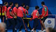 Medical staff carry Slovakia's Tamara Potocka on a stretcher after she collapsed following a heat of the women's 200m individual medley swimming event during the Paris 2024 Olympic Games at the Paris La Defense Arena in Nanterre, west of Paris, on August 2, 2024. Photo by Jonathan NACKSTRAND / AFP