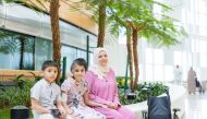 Nine-year-old Mayar (centre) underwent a brain surgery at Sidra Medicine after sustaining a head injury from a blast. Here she is seen with her mother and brother.