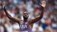 US' Noah Lyles reacts after competing in the men's 200m heat of the athletics event at the Paris 2024 Olympic Games at Stade de France in Saint-Denis, north of Paris, on August 5, 2024. (Photo by Anne-Christine Poujoulat / AFP)