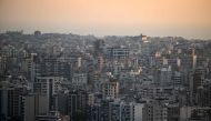 Residential and office buildings stand in Beirut's southern suburbs on August 7, 2024.  (Photo by JOSEPH EID / AFP)