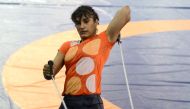 In this photograph taken on May 24, 2016, Indian wrestler Vinesh Phogat takes part in a practice session at a Sports Authority of India (SAI) gymnasium in Lucknow.  (Photo by SANJAY KANOJIA / AFP) 