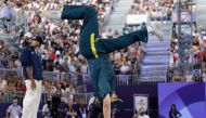 Australia's Rachael Gunn (R), known as Raygun competes against France's Sya Dembele, known as Syssy in the Women's Breaking dance Round robin of the Paris 2024 Olympic Games at La Concorde in Paris, on August 9, 2024. (Photo by Odd ANDERSEN / AFP)