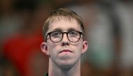 Silver medallist Ireland's Daniel Wiffen poses on the podium of the men's 1500m freestyle swimming event during the Paris 2024 Olympic Games at the Paris La Defense Arena in Nanterre, west of Paris, on August 4, 2024. Photo by Oli SCARFF / AFP.