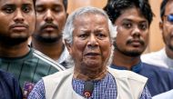 Nobel laureate Muhammad Yunus (C) speaks during a press conference upon his arrival at the Hazrat Shahjalal International Airport in Dhaka on August 8, 2024. 
 (Photo by Munir UZ ZAMAN / AFP)