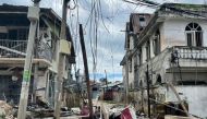 This photo taken on August 10, 2024 shows destroyed and damaged buildings in Lashio in Myanmar's northern Shan State, following fighting between Myanmar's military and Myanmar National Democratic Alliance Army (MNDAA) in the region. (Photo by AFP)