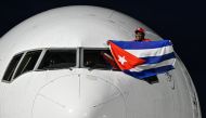 Paris 2024 Olympic Games men's greco-roman 130kg wrestling gold medallist Cuban Mijain Lopez, arrives at Havana's Jose Marti airport on August 12, 2024. (Photo by ADALBERTO ROQUE / AFP)
