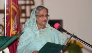 Sheikh Hasina speaks as she is sworn in for her fourth spell as Bangladesh's prime minister at the Presidential Palace in Dhaka on January 7, 2019. / AFP / Munir UZ ZAMAN