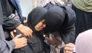 Palestinians mourn their relatives, killed in an Israeli strike, at the Al-Aqsa Martyrs hospital in Deir el-Balah in the central Gaza Strip on August 17, 2024. Photo by Eyad BABA / AFP