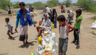 Displaced Yemenis affected by recent floods receive humanitarian in the Hays region, south of Hodeidah Governorate, west of August 16, 2024. Photo by Khaled Ziad / AFP.