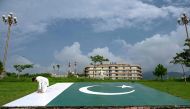 People work near the Pakistan Telecommunication Authority (PTA) headquarters building in Islamabad on August 16, 2024. (Photo by Aamir Qureshi / AFP)

