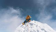 This handout photograph taken on April 12, 2024, and released by 14 Peaks Expedition shows Nepali mountaineer Nima Rinji Sherpa at Mount Annapurna. (Photo by 14 Peaks Expedition / AFP)
